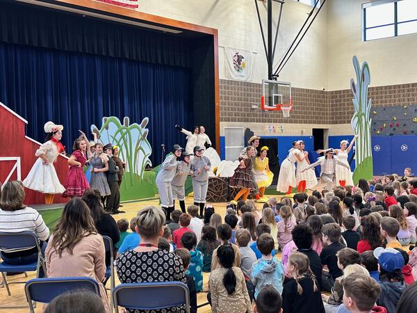 The cast of Honk performing at Copeland school
