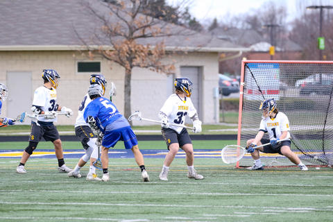 Vernon Hills #5 shoots and scores against Glenbrook South