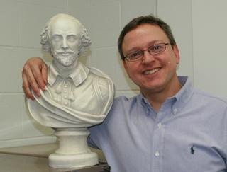 Dr. Reiff with bust of Shakespeare